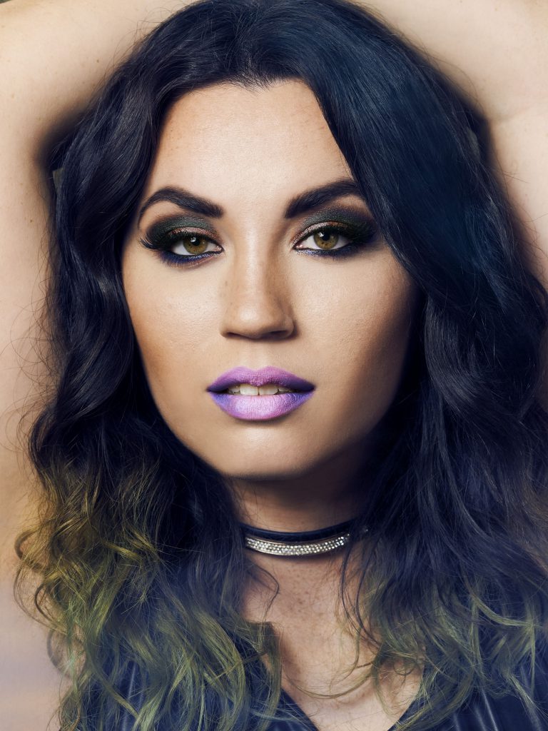 high fashion model with purple lipstick