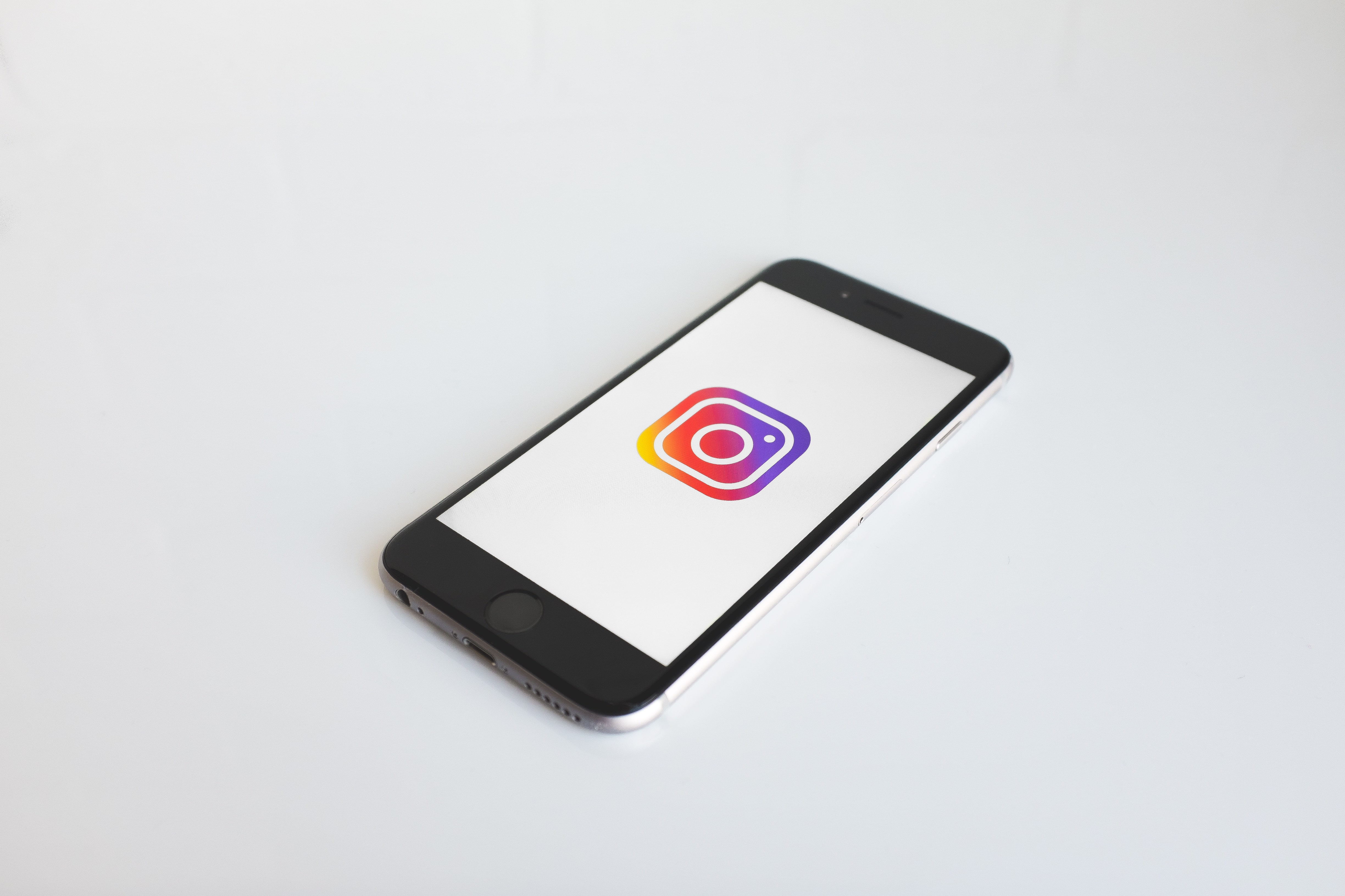 iPhone with Instagram on screen